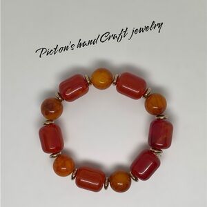 Vibrant Red and Orange Beaded Bracelet